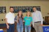 School Counselor Kris Hoffman, Valedictorian Maya McHugh, Salutatorian Linnea Henrikson, Principal Bill DeWitt